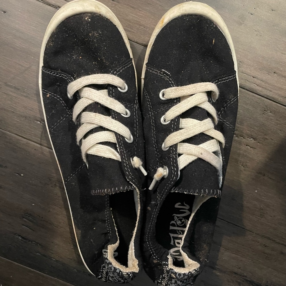 Very Used Tennis Shoes
